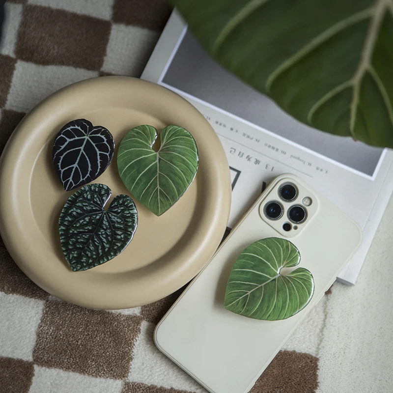 

Wholesale Plant Leaves Phone Grips Mobile Phone Holder Professional Acrylic Phone Socket Stand Custom Logo, Black / white / custom