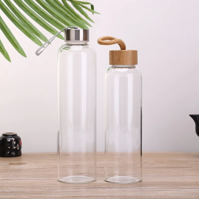 

Mikenda unbreakable glass water bottle borosilicate wholesale water glass bottle with bamboo lids, Can be customized