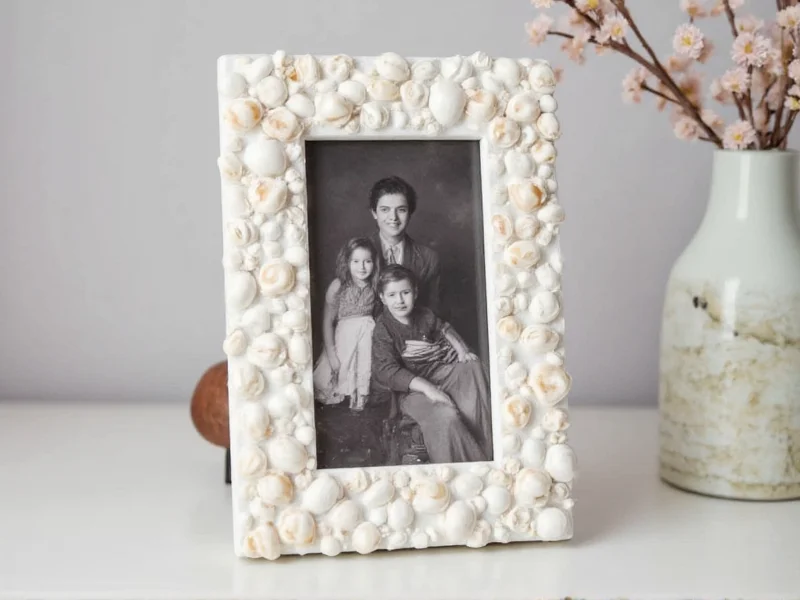 Handmade shell picture frame with family photo