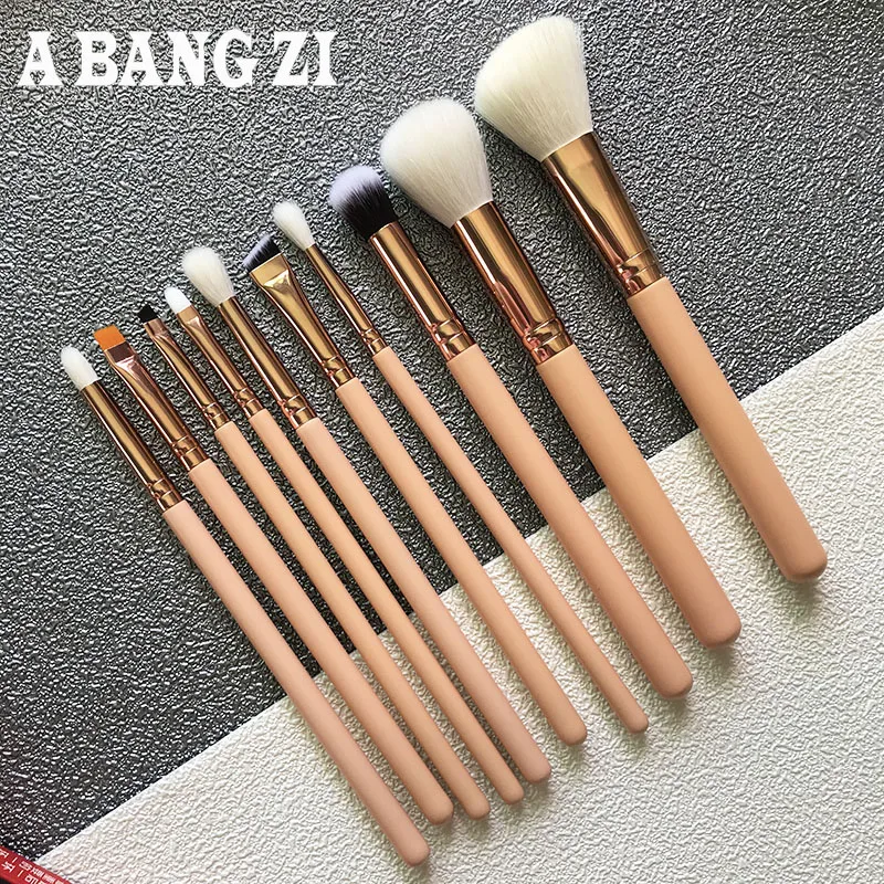 

10pcs skin tone pink makeup brushes goat hair professional makeup customized set could d owith your own shape on small quantity