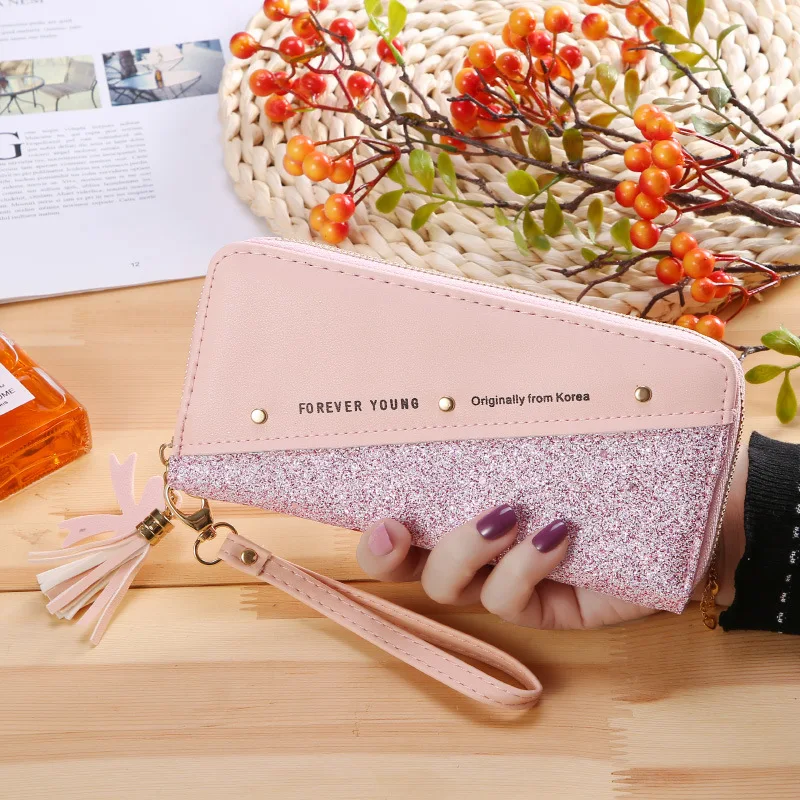 

New women's wallet long zipper gold powder female student Korean version stitching hit color tassel wild mobile phone bag