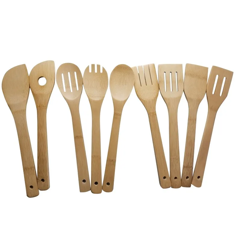 

Bamboo spatula in stocked kitchen gadgets for cooking, Natural
