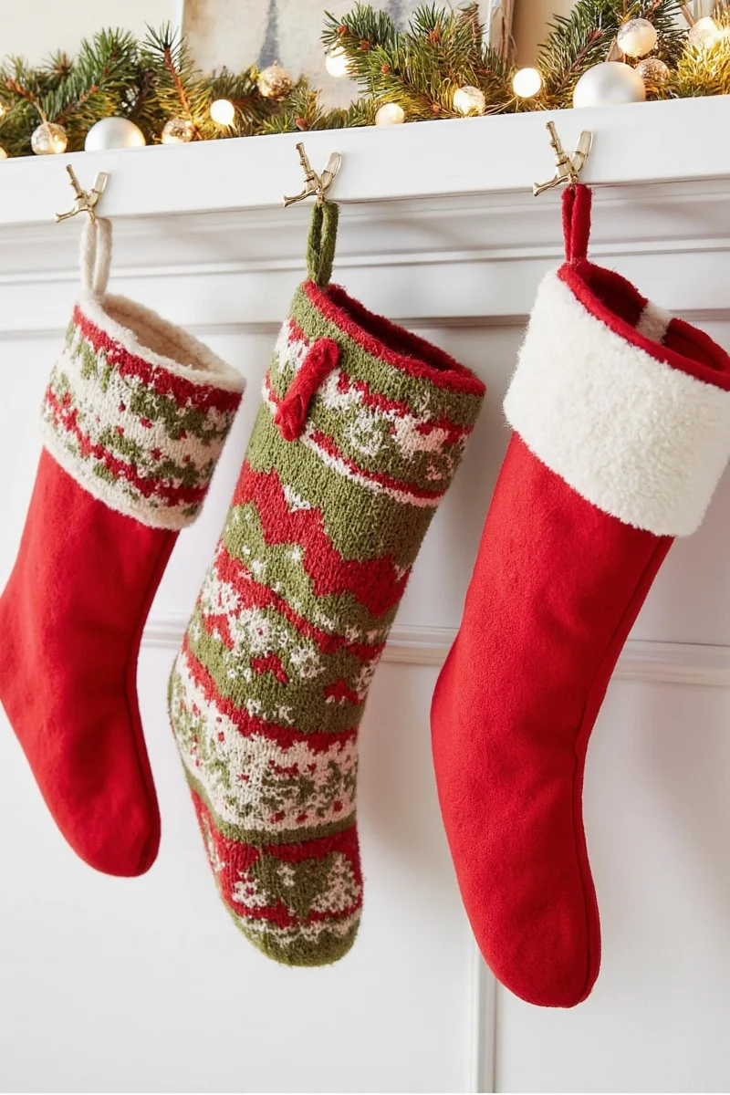 Mini Christmas stockings clipped to a garland