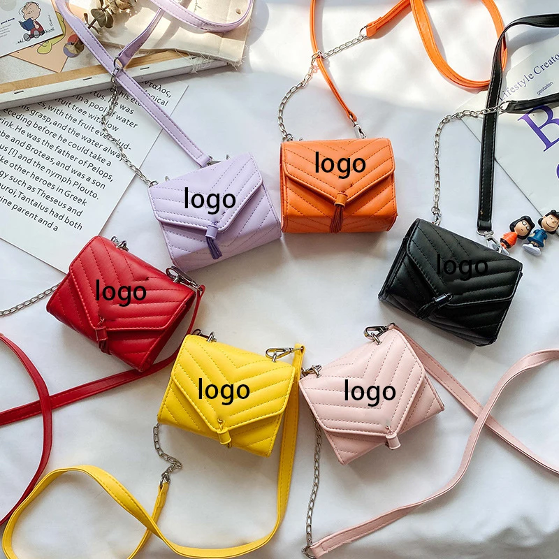 

2021 Purse Trending Handbag Shoulder Messenger Mini Small Handbag Metal Logo Tassel Leather Purse Kids Bag For Girls, 6 color