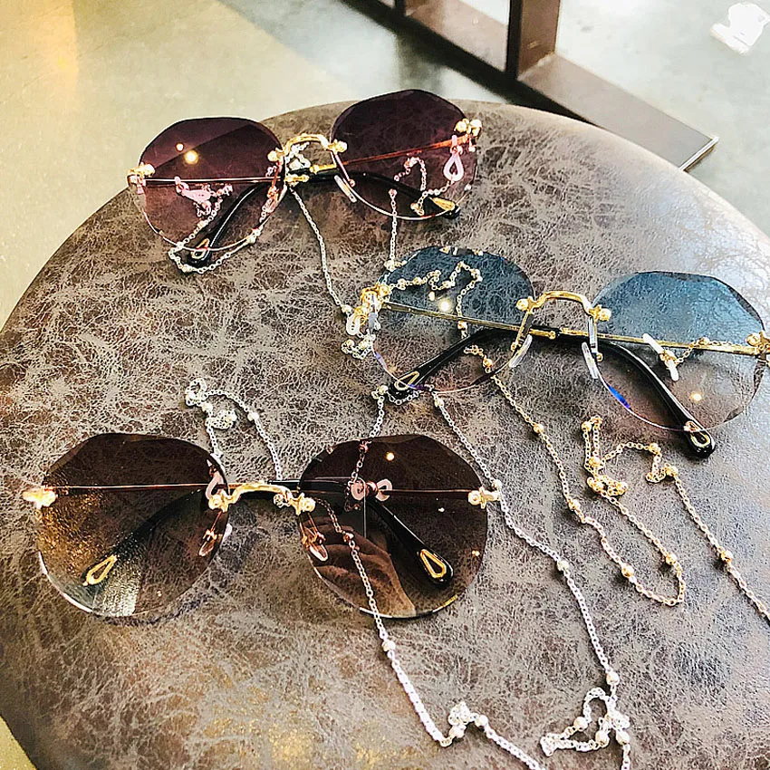 

2020 Korea Oversized Brand Design Rimless Ultraviolet-proof Womens Sunglasses with Chain