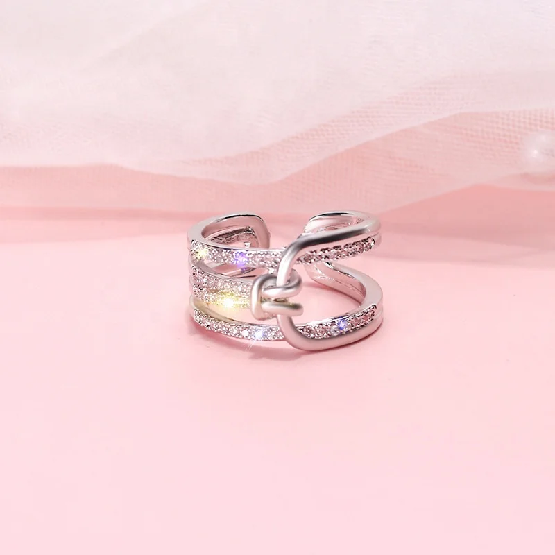 

Shiny Temperament Bling Bling Cubic Zircon Tie Bow Charm Rings for Women Gold Color Adjustable Open Ring Statement Jewelry, Picture shows