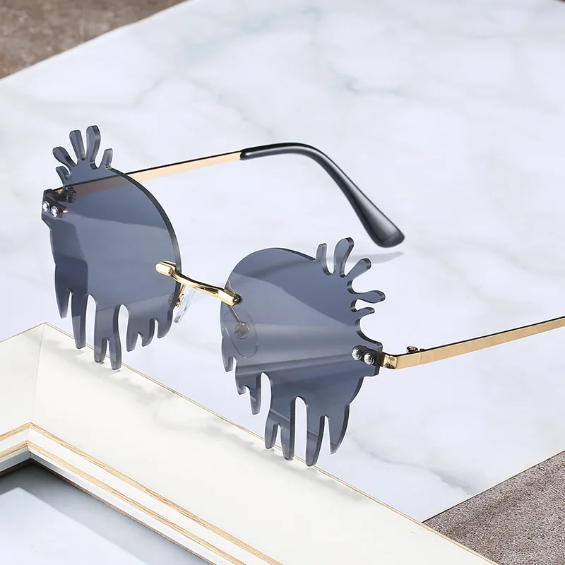 

Hip hop sunglassesHigh Quality Custom Logo UV400 designer fashion trend Rimless frame Sunglasses ce cat.3