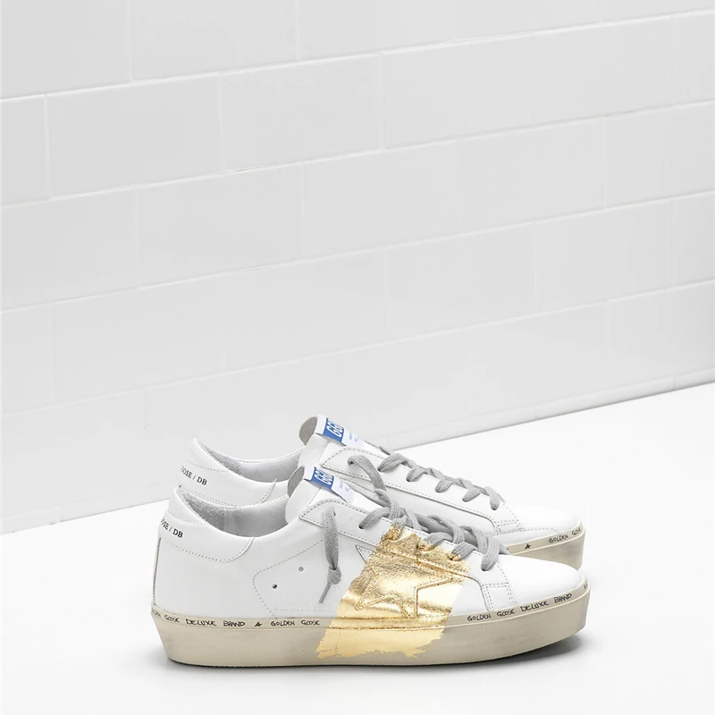 

Goldens HI STAR Sneakers G33WS945.A1 Upper in calf leather 24-carat gold leaf Branding handwritten on the Gooses Shoes