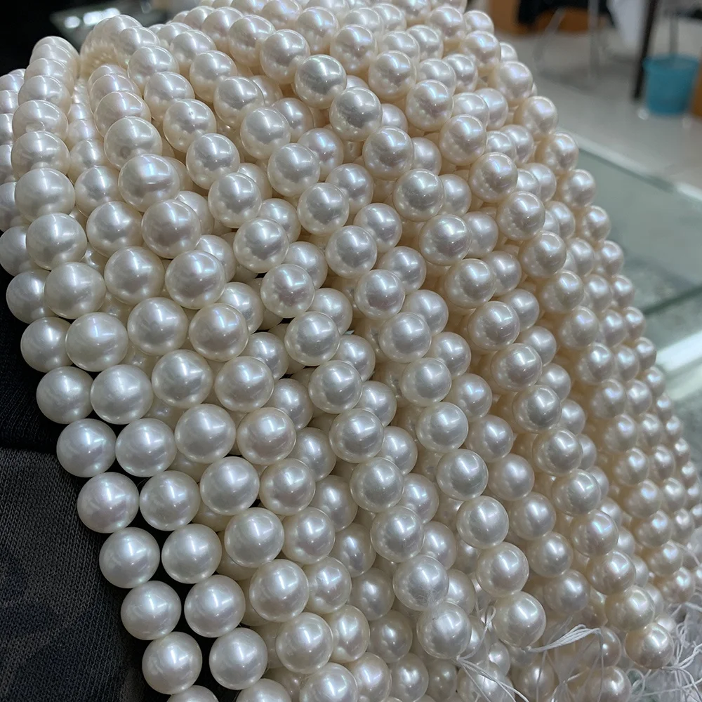 

Natural cultured pearl Top quality wholesale white color 10-11mm perfect round no spots freshwater pearls long strings