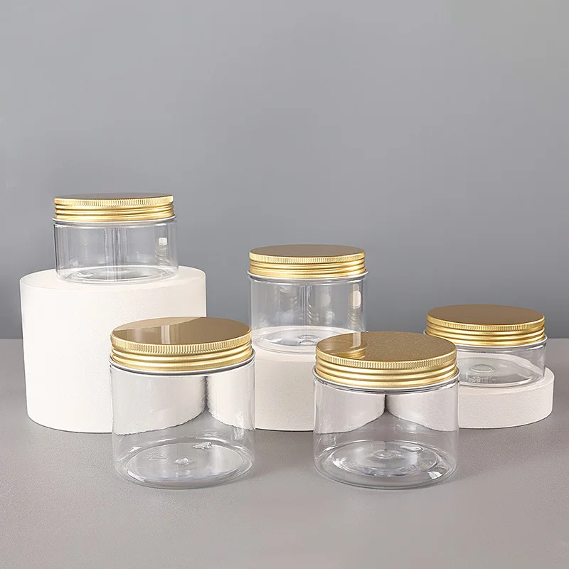 

New cosmetic packaging 80ml 100ml 120ml 150ml 180ml 200ml food grade PET round plastic jars with gold plating aluminum lids