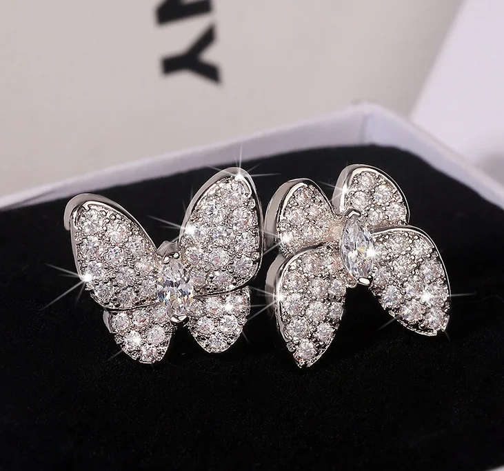 

Manufacturer direct sale Fashion Lady KYRA01074 CZ Ring Shine 3A Zircon Butterfly Shape  Rings for women girl, Silver