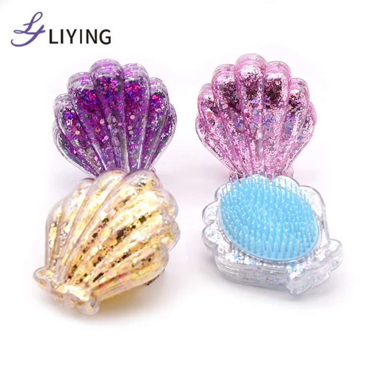

Hot selling small MOQ mermaid shell shape gold air brushes and combs for extensions