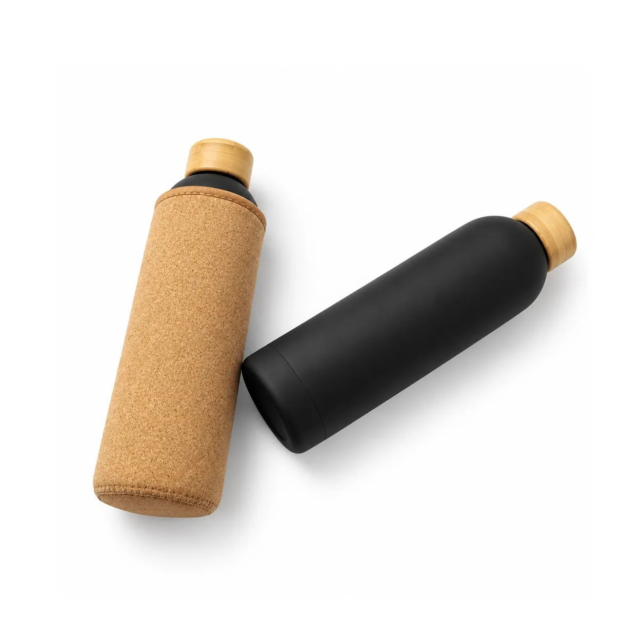 Two matte black steel bottles lying diagonally, one wrapped in a stitched cork sleeve and one bare