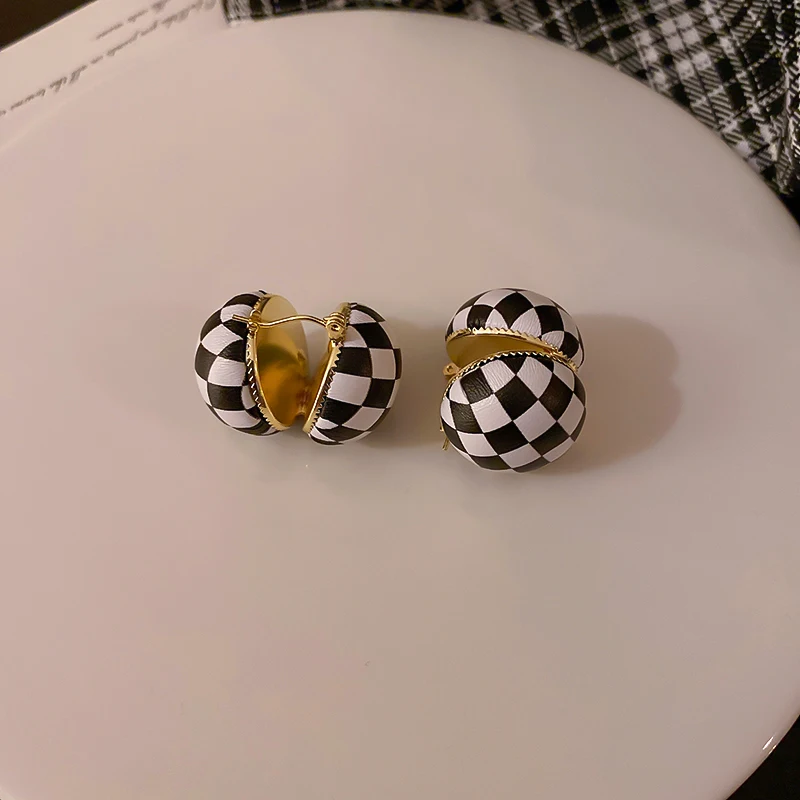 

black white leather geometric round clip on earrings