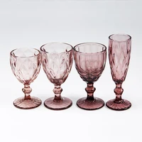 

Wholesale colored glassware embossed vintage goblet amber multi color wine drink glass stemware goblet