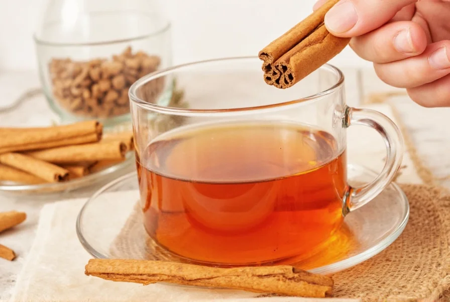 Close-up of cinnamon sticks simmering in a glass teapot with steam rising, natural lighting