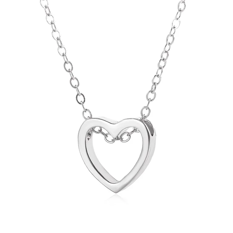 

Simple Fashion Accessories Women'S Hollow Out Peach Heart Pendant Collarbone Chain Lovers Stainless Steel Necklace Wholesale, Picture shows