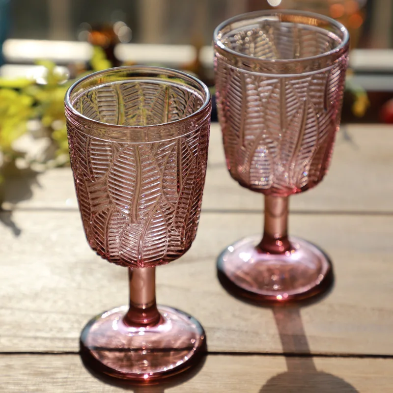 

Wholesale cheap Glassware Colored Machine press antique engraved Embossed leaves Crystal Vintage Colored red wine glass goblet, Picture