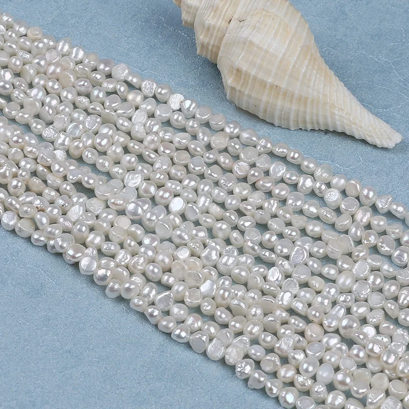 

Wholesale natural freshwater  side drilled baroque pearl strand, White