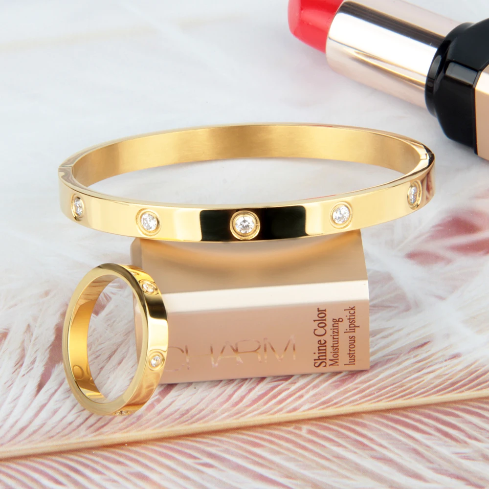 

Set of high quality titanium steel inlaid diamonds ladies accessories 316L stainless steel gold ring bracelet women