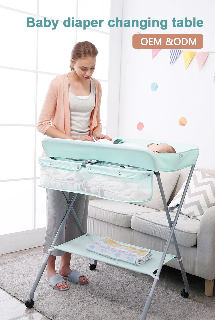 baby on changing table