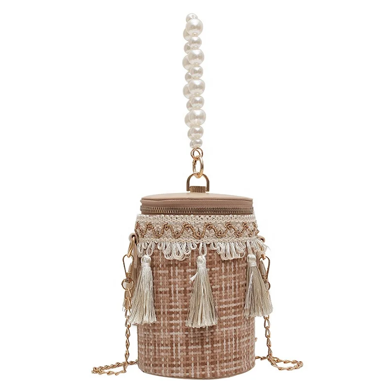 

Bohemian style 2021 new fashion personalized shoulder woven bags barrel shape vintage straw handbag with pearl handle and tassel