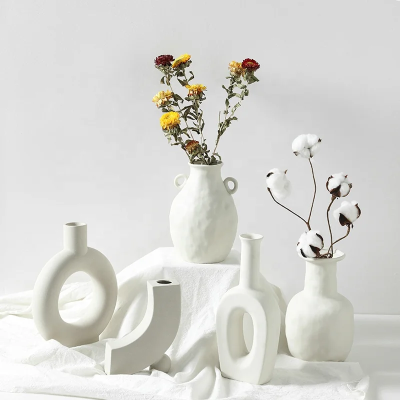 

Nordic Luxury White Ceramic Irregular Vase Plant Abstract Porcelain Vases Home Decoration
