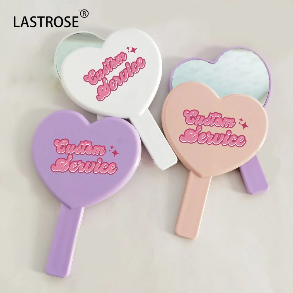 

Custom Logo Pink Heart Mirror Wholesale Heart Shape Makeup Mirror Make Up Pocket Hand Held Mirrors