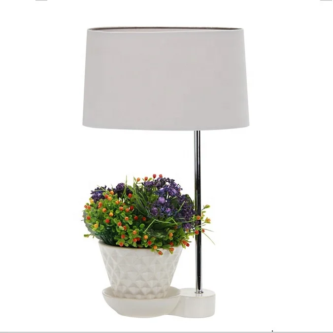 

ceramic flower pot with table lamp together, Brown