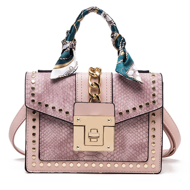 

2020 wholesale serpentine mini crossbody bags designer handbags famous brands for women shoulder rivet ladies small messenger