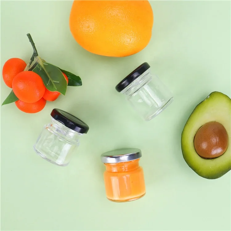 

Wholesale 25ml 35ml 50ml 100ml Mini Empty Clear Glass Round Storage Jars With Metal Lids For Jam