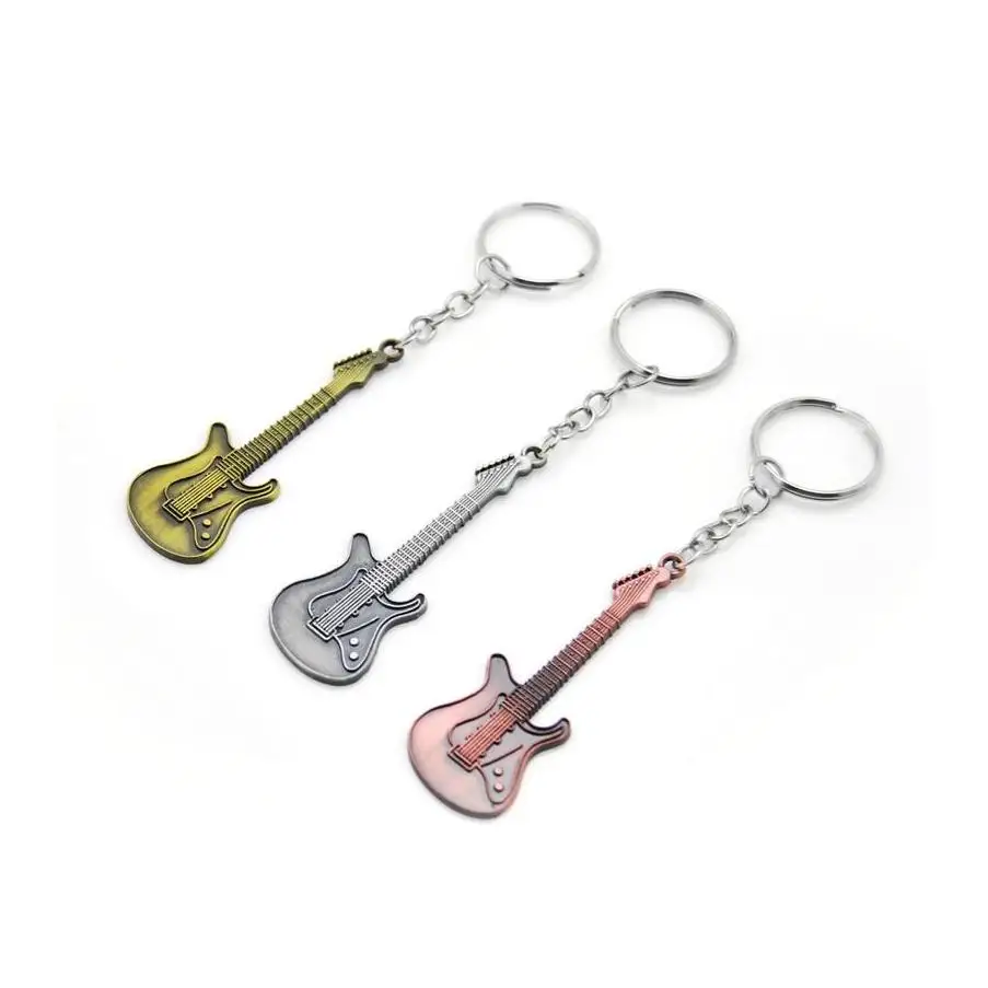 

Original Fashion Unique Guitar Alloy Keychains Purse Bag Buckle Handbag Pendant For Car Keyrings Women Key Chains Gift