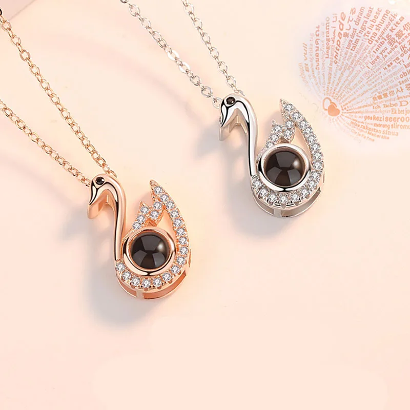 

RFJEWEL I love you projection necklace pendant swan chain women's jewelry wholesale 100 languages necklaces