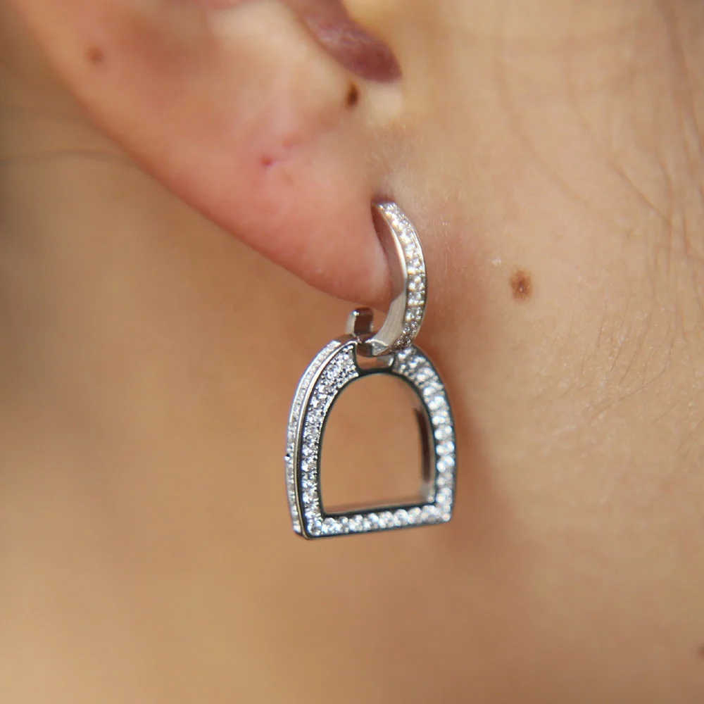 

2020 high quality micro pave clear cz top quality sparking dangle ear horse lover iron stirrup equestrian earring, Picture