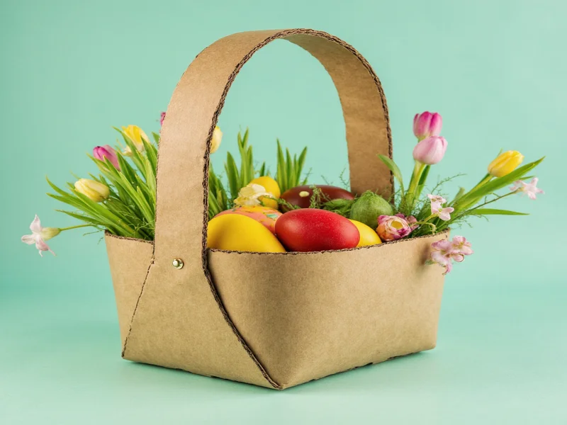 Recycled cardboard Easter basket with spring flowers