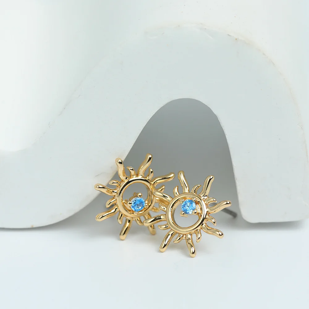 

French 18K Gold Plated Inlaid Blue Crystal Sun Earrings Hollow Sun Flower Stud Earring for Ladies