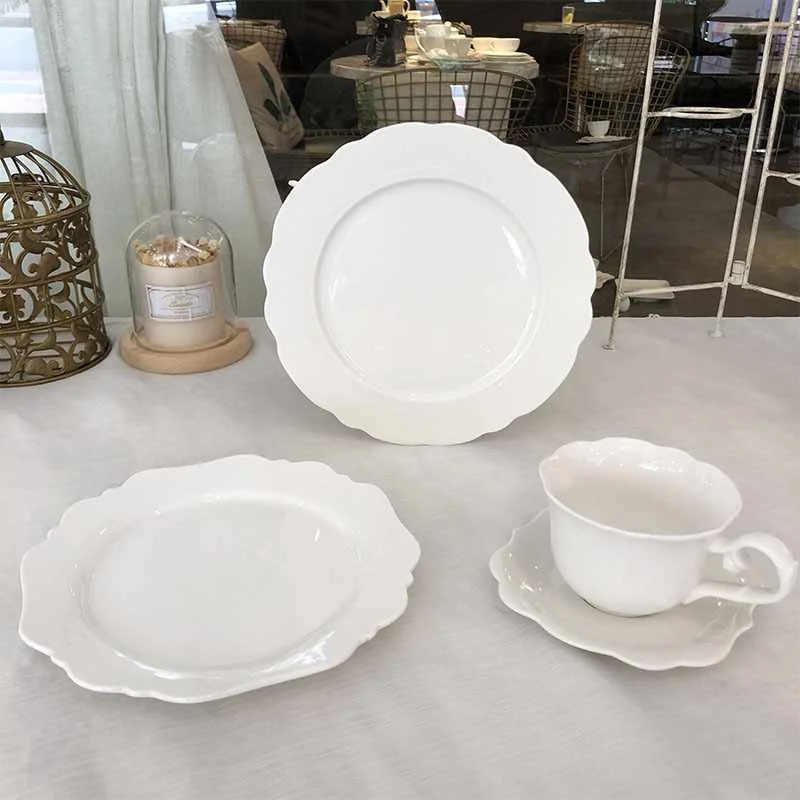 

Spot stock ceramic plate North European petals edge ceramic dessert fruit plate promotion wholesale, White