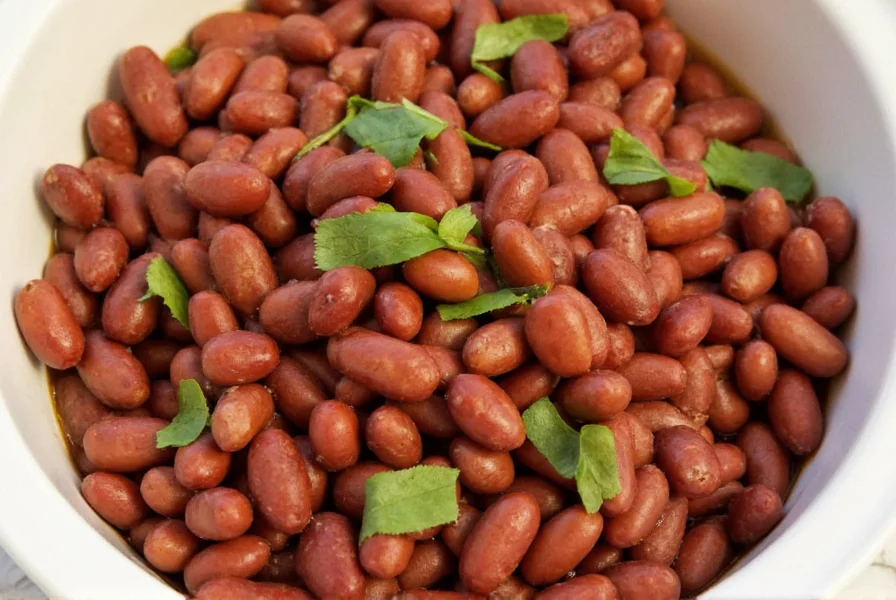 A slow cooker filled with borracho beans