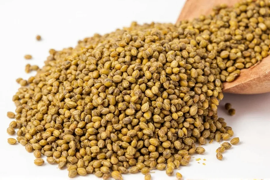 Close-up photography of three types of mustard seeds: yellow, brown, and black arranged in separate piles on a wooden table