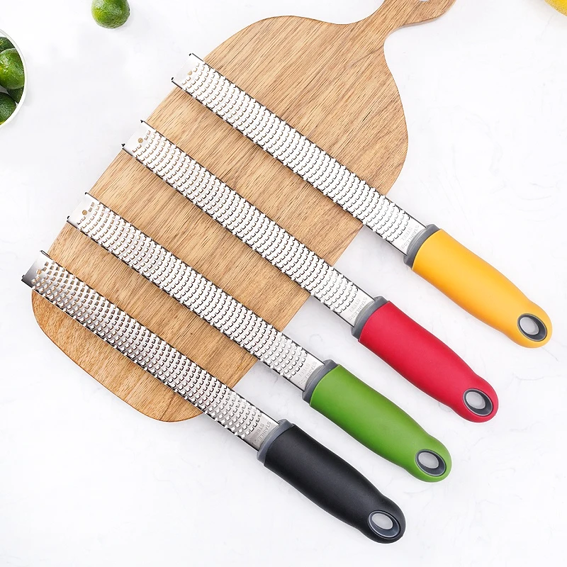 

Professional Microplane Stainless Steel Lemon Zester with Safety Cover, Green;red;yellow;black