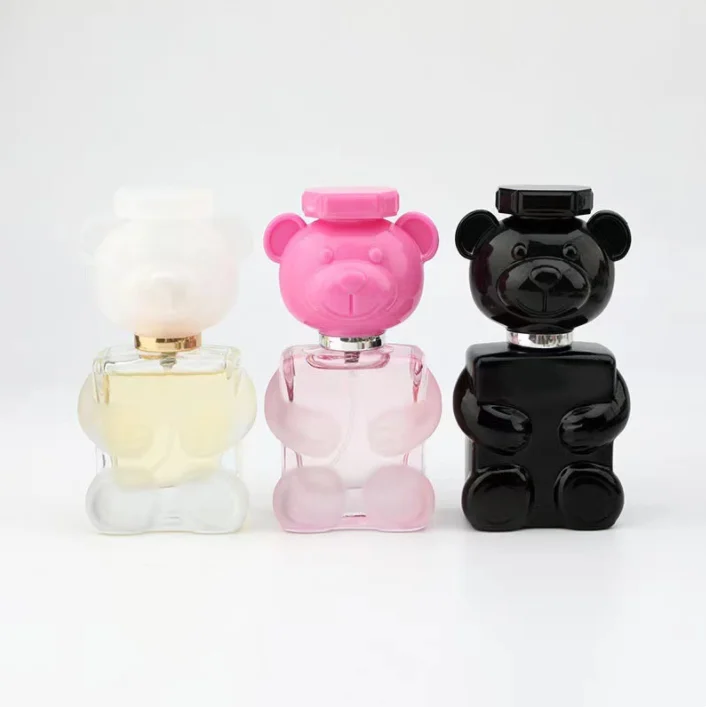 

Wholesale unique pink clear black cosmetic packaging 30ml 1oz empty refilling perfume glass spray bottle