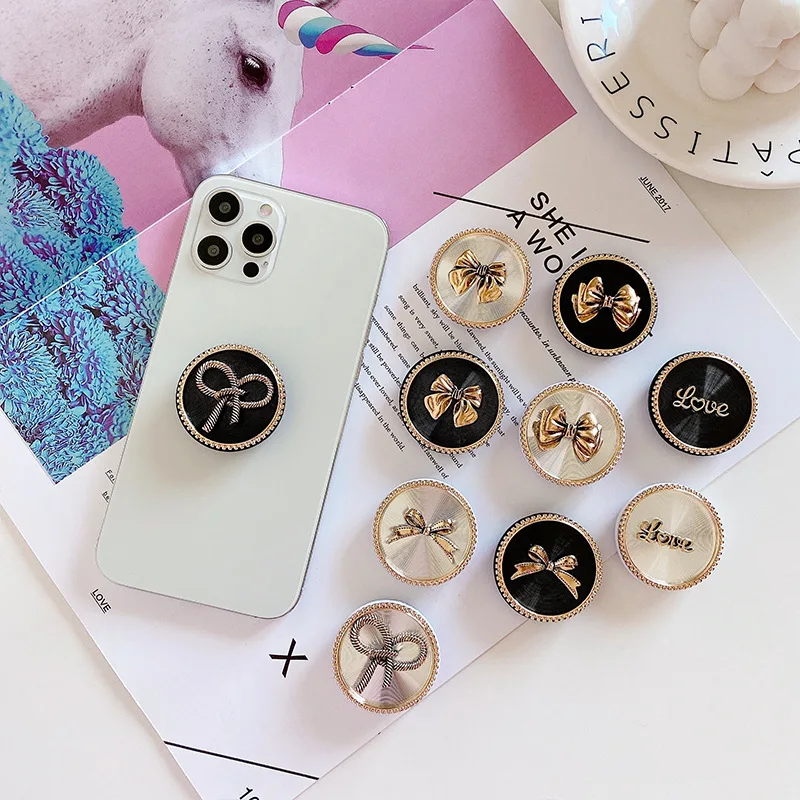 

Pretty Golden Bowknot Folding Metal Phone Holder Adjustable Suction Bracket Phone Accesories Holder