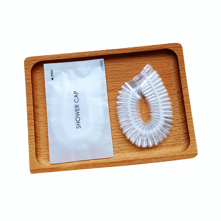 

Disposable transparent shower cap for use in hotels tourism and spas individually packaged family use (sample free)