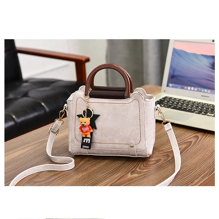 

New product hot sale 2020 handbags for women for small short handle with tassel