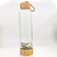 

Wholesale natural bamboo cover Opal crystal gravel infused energy glass water bottles