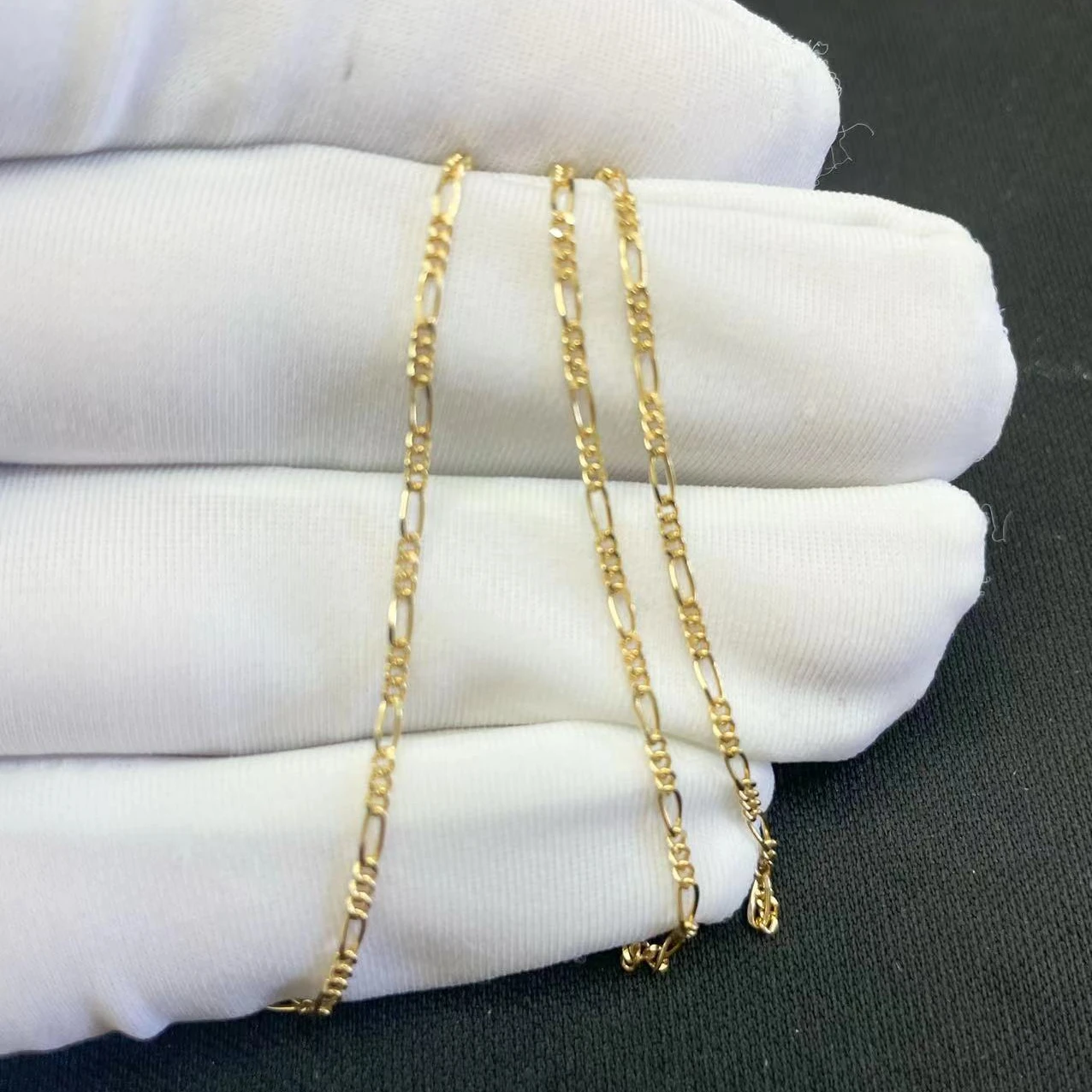 

Hot Selling Au750 Gold 18K Real Solid Pure Gold Chain Roll Figaro Gold Necklace Chain Jewelry Wholesale Bulk Chains by Meter