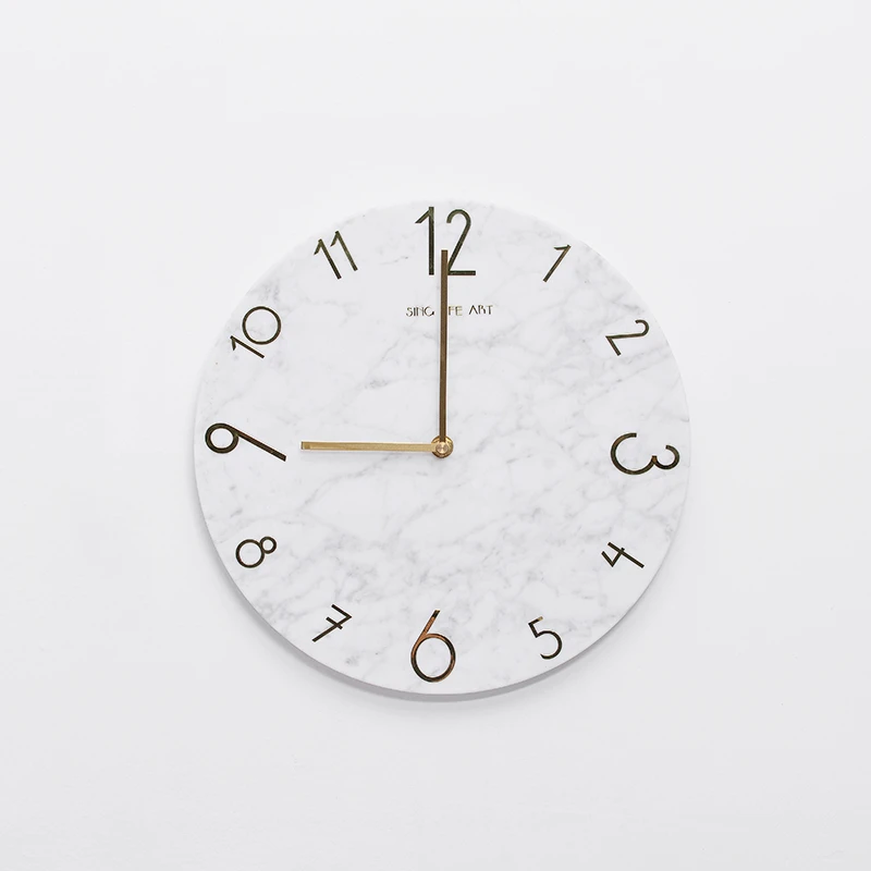 

White Marble Stone and gold pointer decorate wall clock