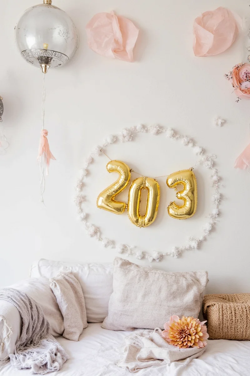 Dining table decorated with silver sequin runner and confetti-shaped coasters