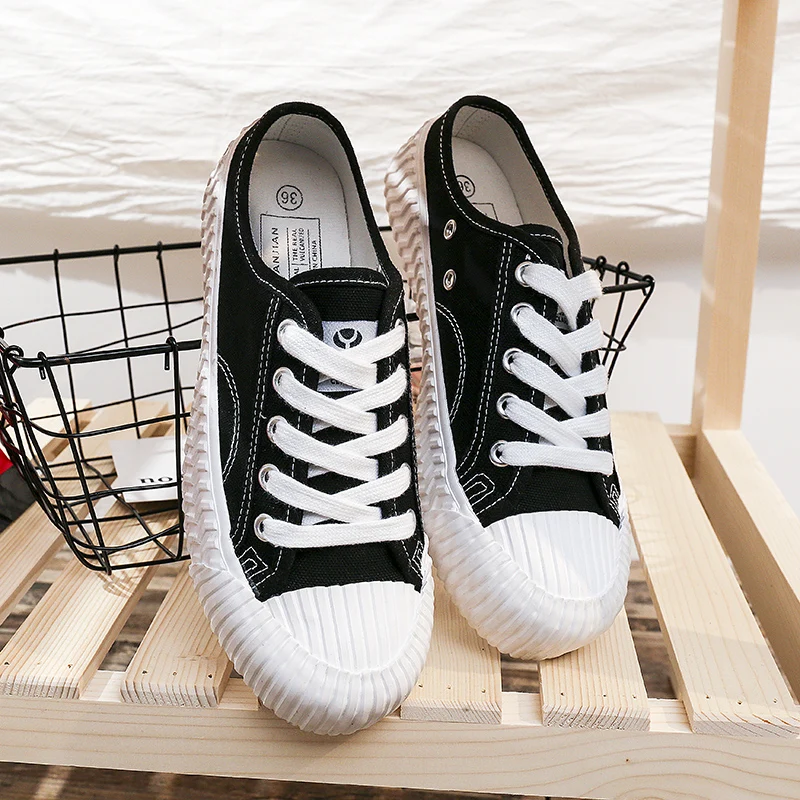 

Wholesale women black branded without heel half slippers casual canvas shoes