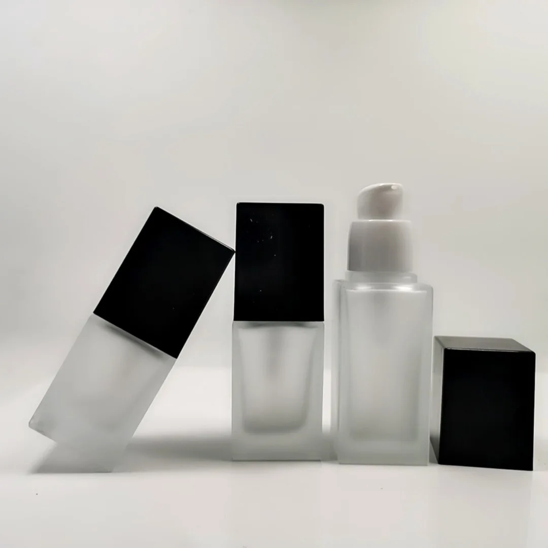 

China made 30ml square clear cosmetic black cap glass frosted lotion bottle with pump for foundation